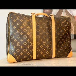 Louis Vuitton travel bag